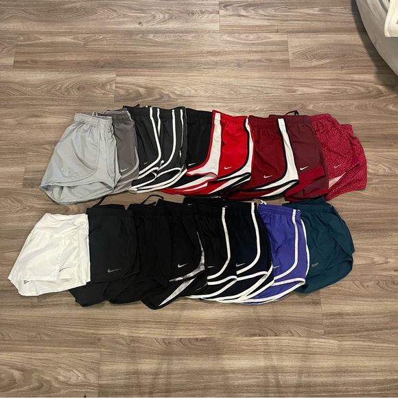 Nike Pants - Nike tempo running shorts women size medium & large bundle of 17 pairs of shorts